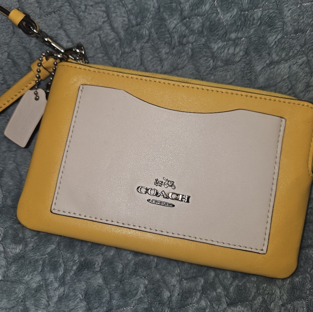 SOLD. Coach Yellow and White Leather Wristlet